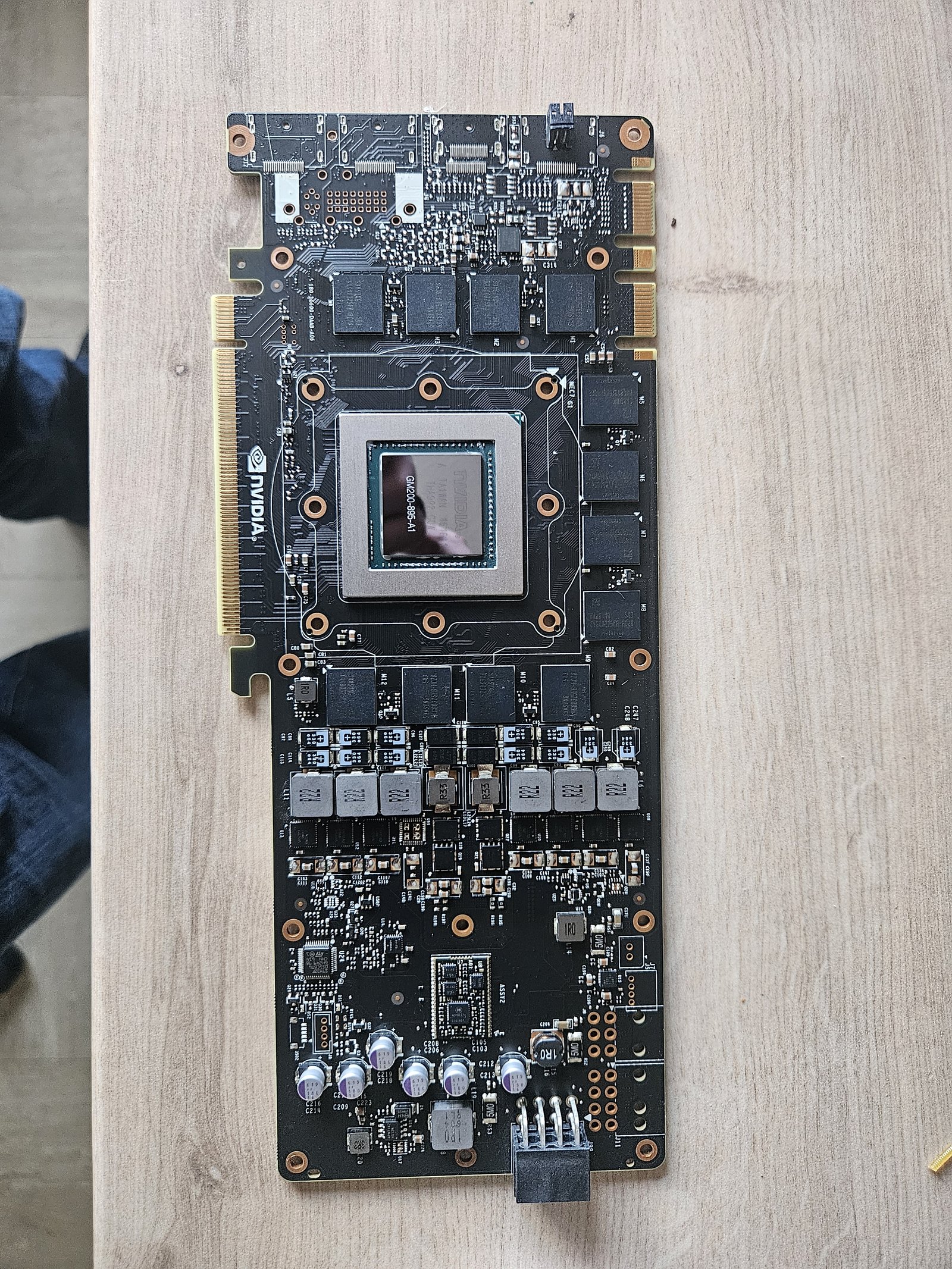 GPU die cleaned back to bare silicon, ready for fresh paste