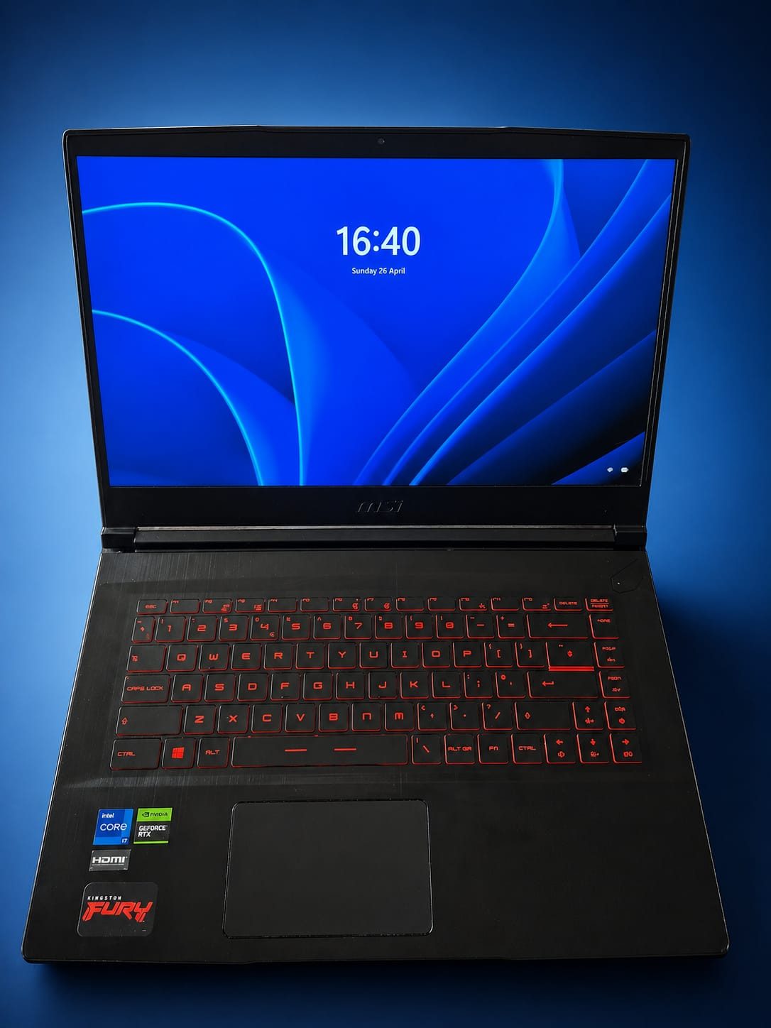 Laptop on the workshop bench with the lid open