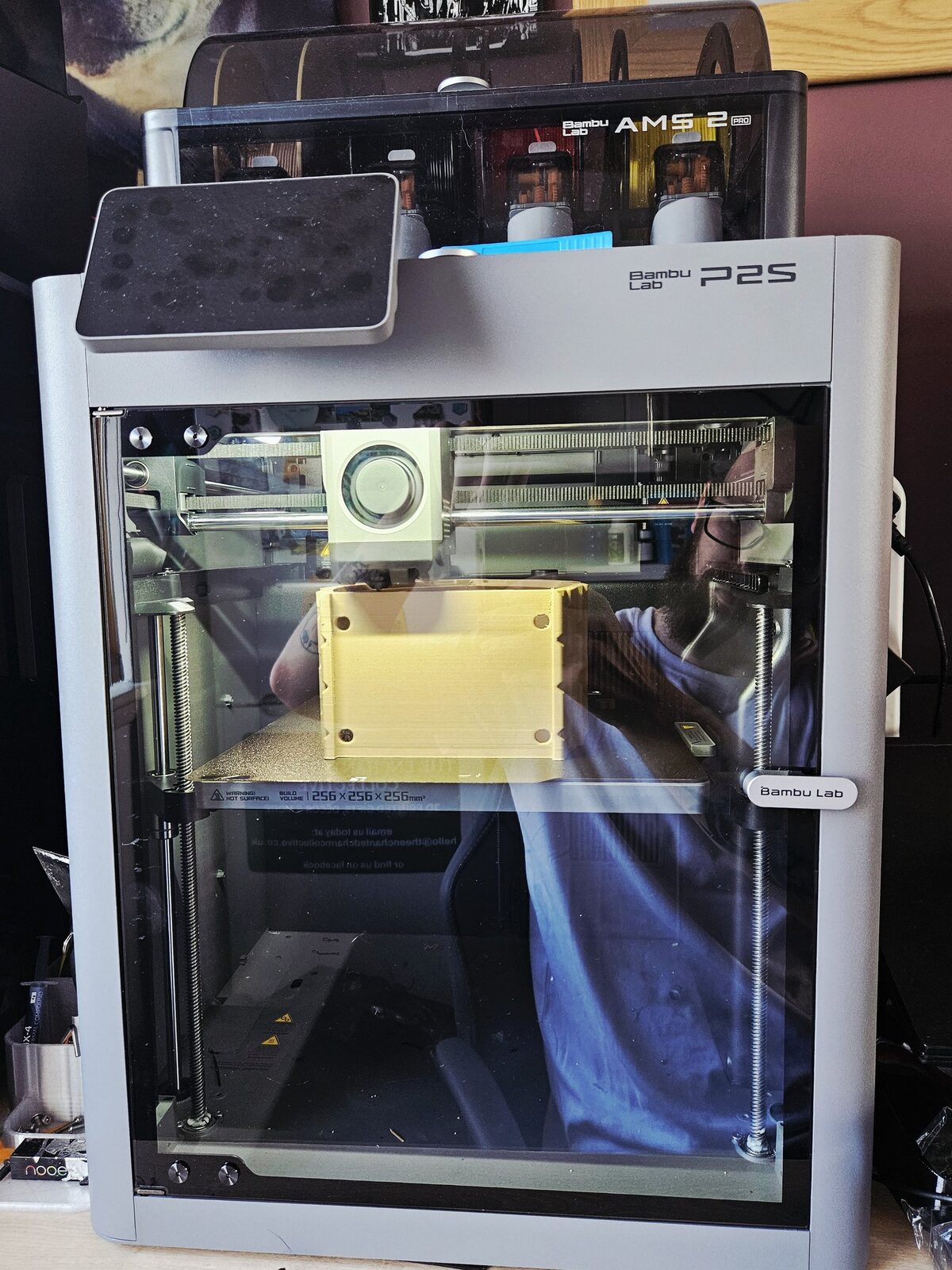 Enclosed CoreXY 3D printer mid-print on the Hark Tech bench