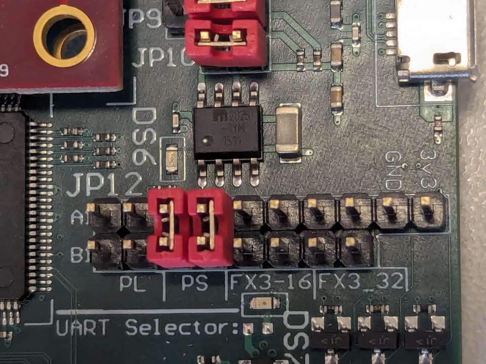 UART debug header wired up to a firmware-locked board