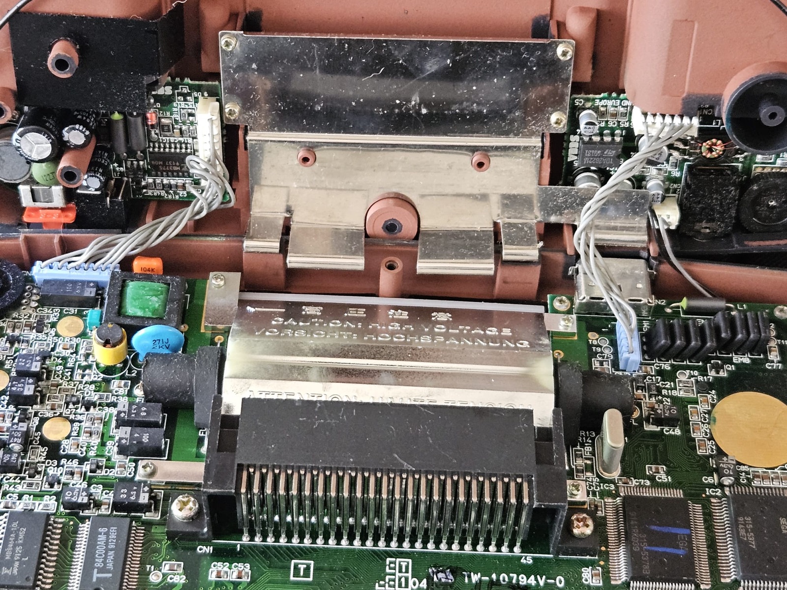 The Game Gear opened up: main board with the cartridge slot at the bottom, power board top left, sound board top right