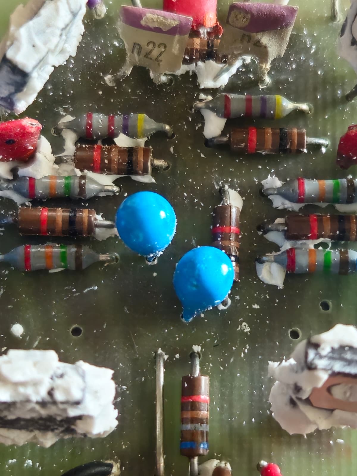 Close-up of the two 220pF output capacitors marked n22