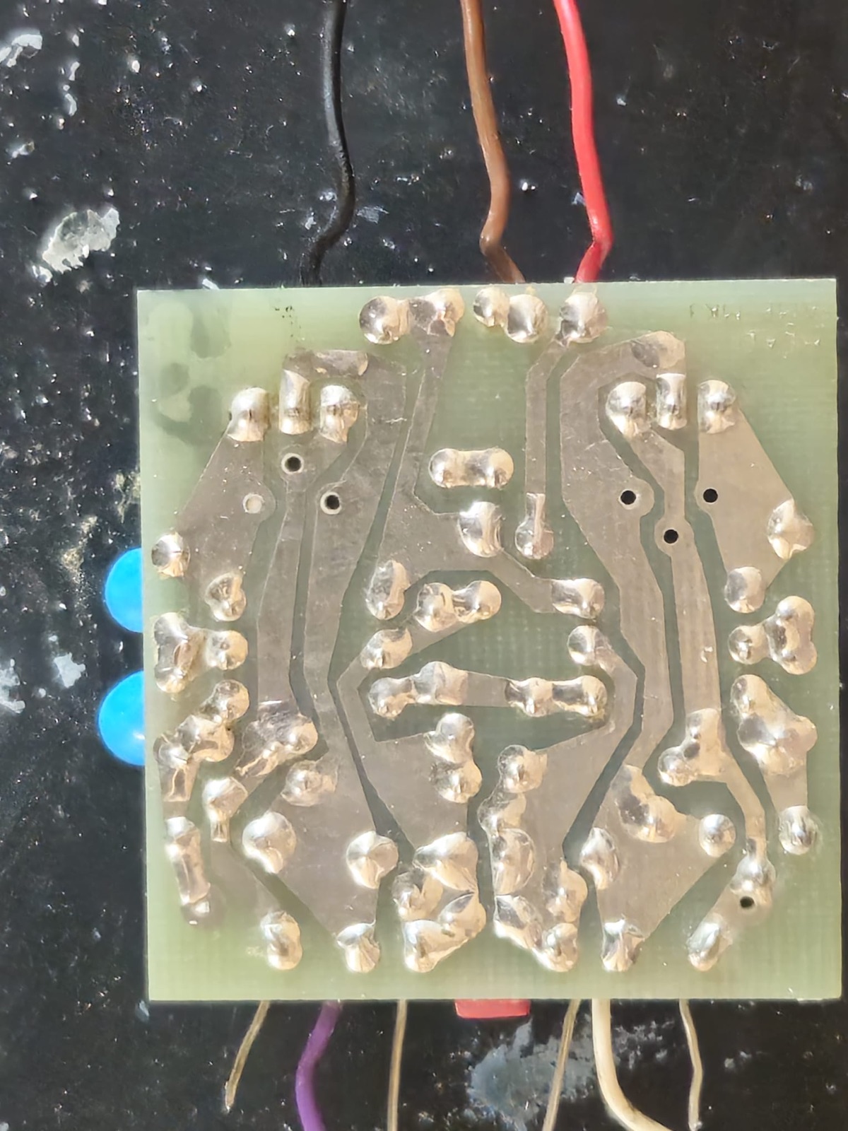 The solder side of the Lentek board after every joint was reflowed
