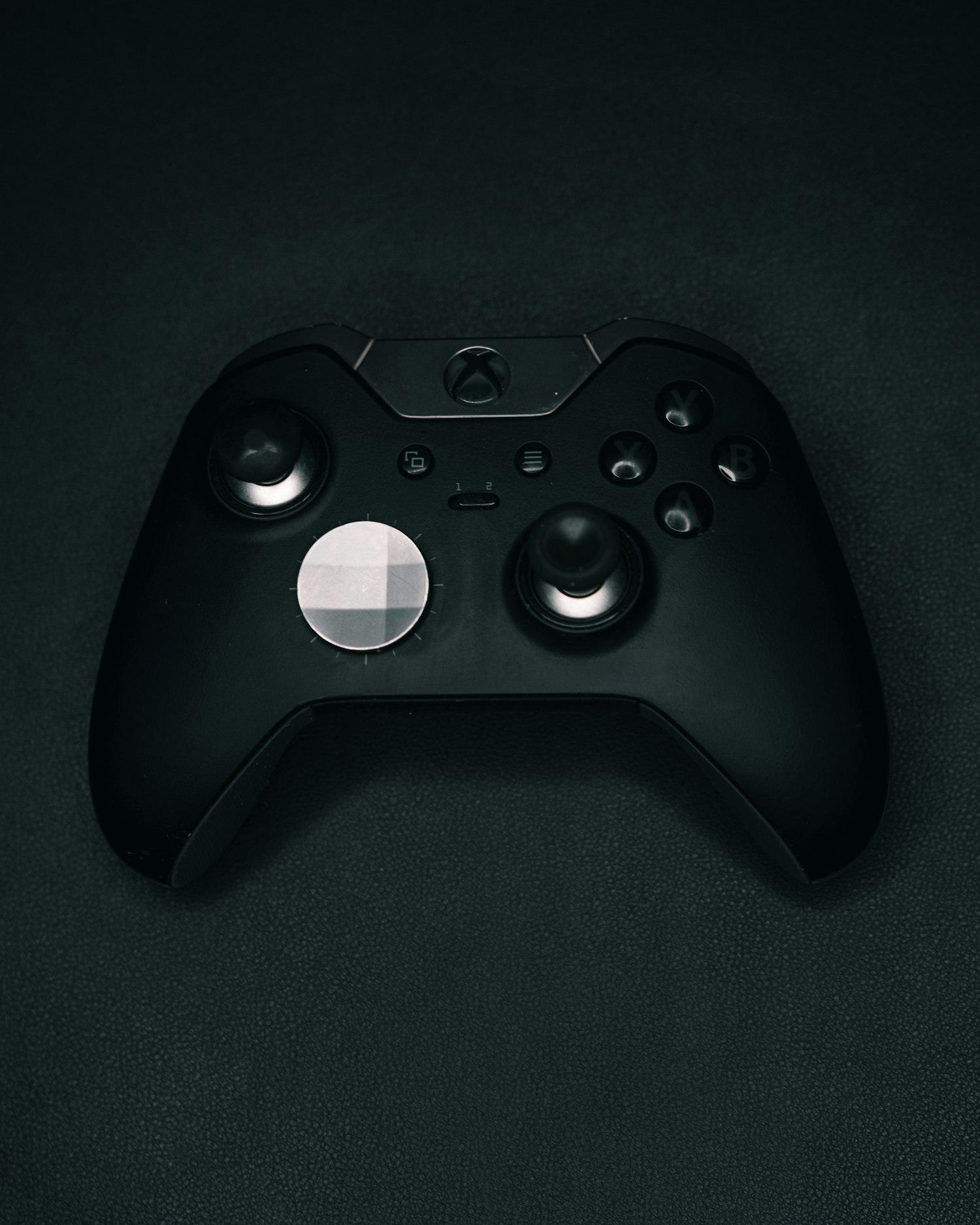 Black Xbox controller on a dark background &mdash; Hark Tech Elite Series 2 repair